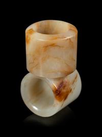 Two Russet and White Jade Archer's Rings