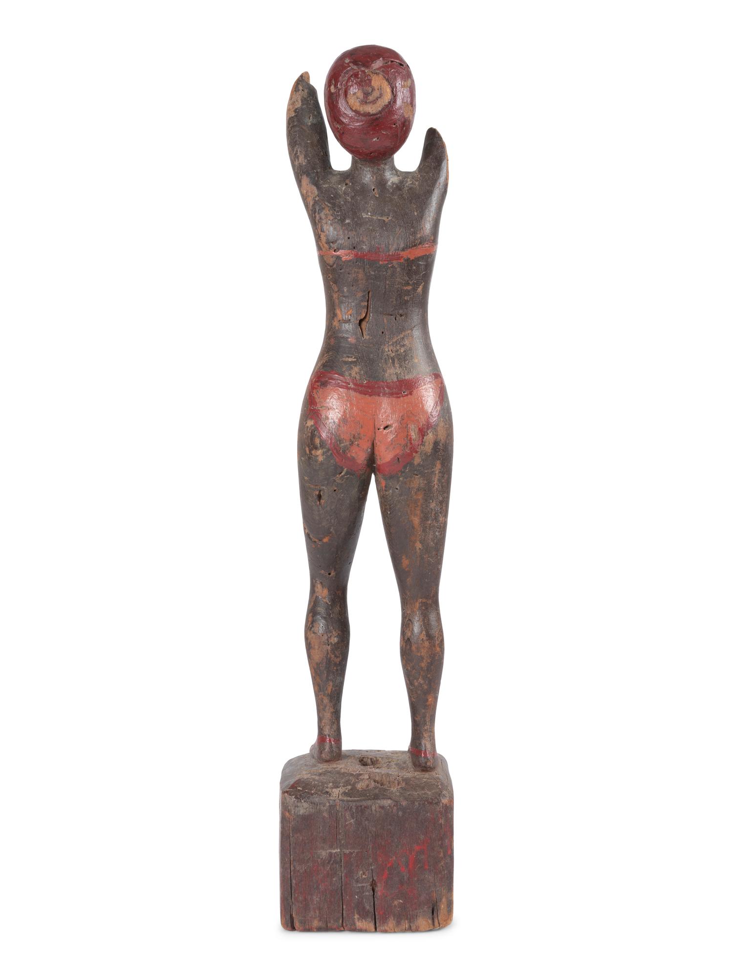 A Carved and Painted Wood Bather Figure