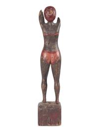 A Carved and Painted Wood Bather Figure