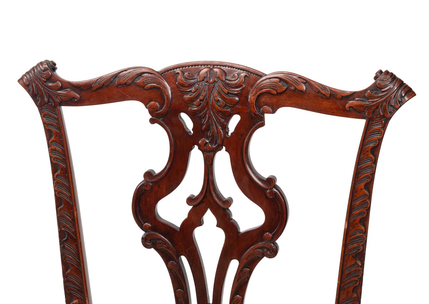 A Set of Fourteen George III Style Carved Mahogany Dining Chairs