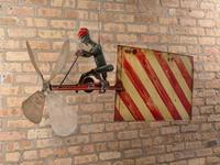 A Cast Iron and Sheet Copper Cycling Automoton Whirligig