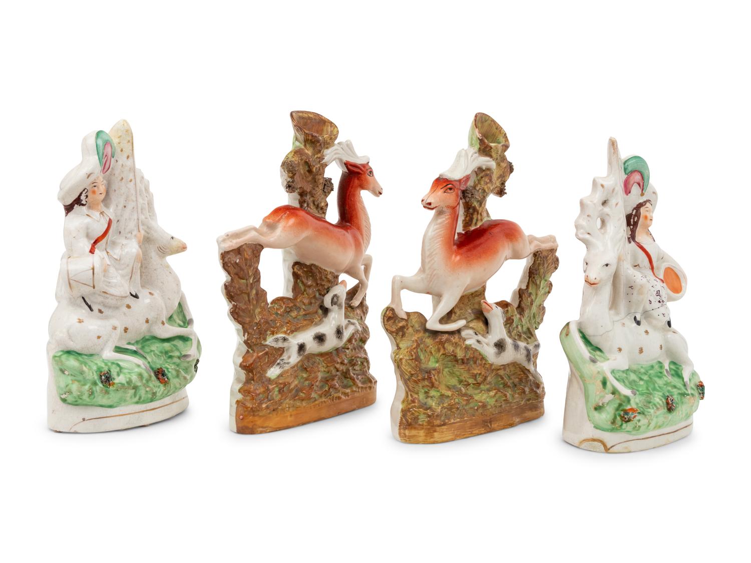Two Pairs of Staffordshire Figural Groups