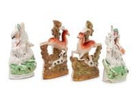 Two Pairs of Staffordshire Figural Groups