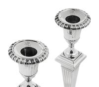 A Pair of English Silver Candlesticks