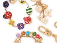 Five Louis Vuitton pieces, 2000-10s: One Bracelet & Four Purse/Key Chains