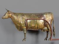 A Molded and Parcel Gilt Copper and Zinc Steer Weathervane