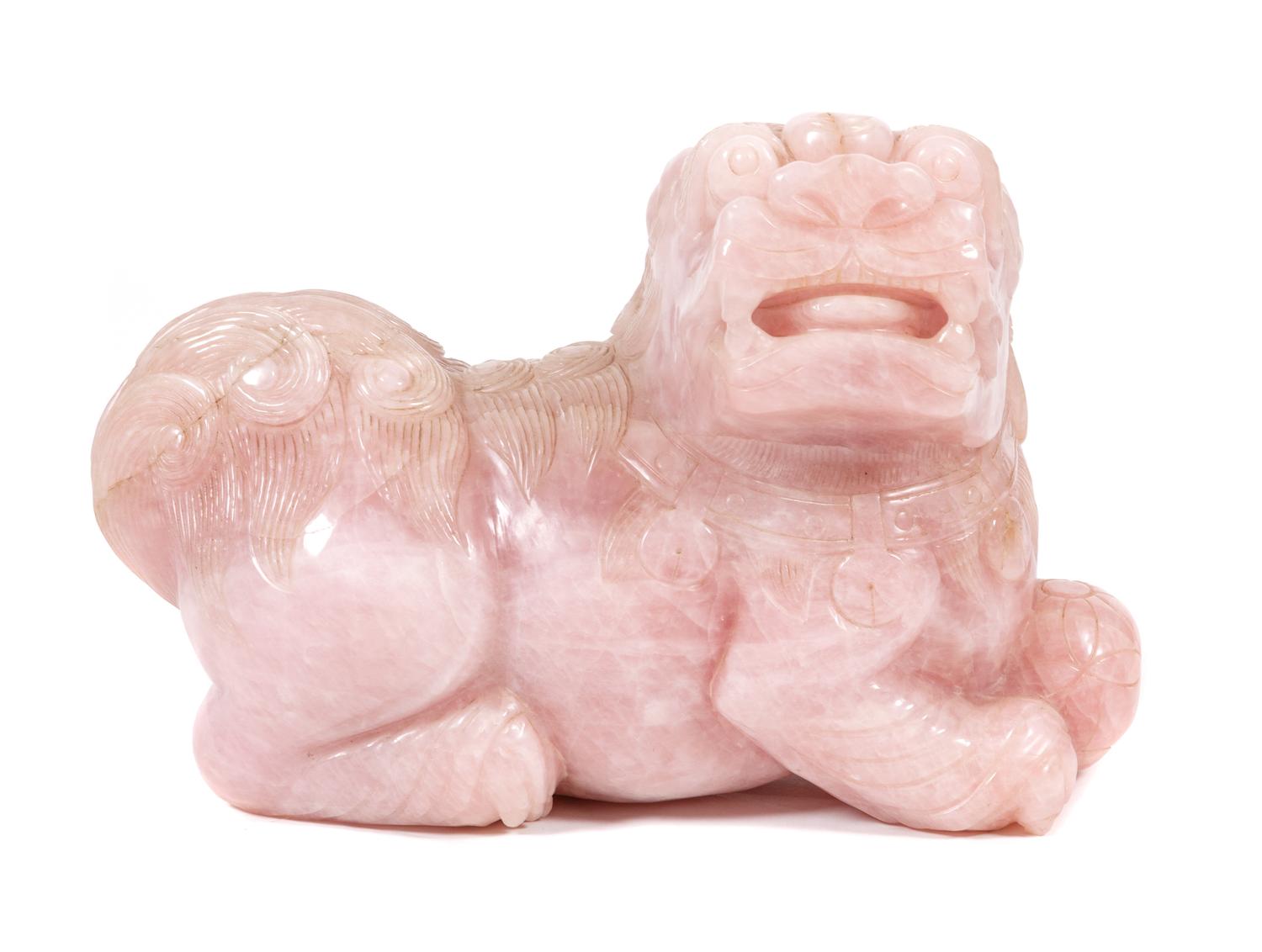 A Rose Quartz Chinese Foo Dog Height 14 x width 19 x depth 10 inches.
