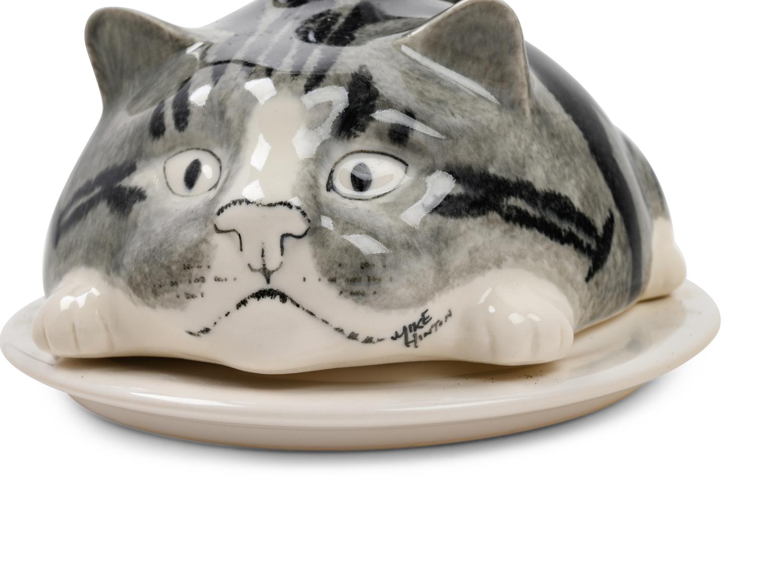 A Pair of Ceramic Figural Butter Dishes and Covers