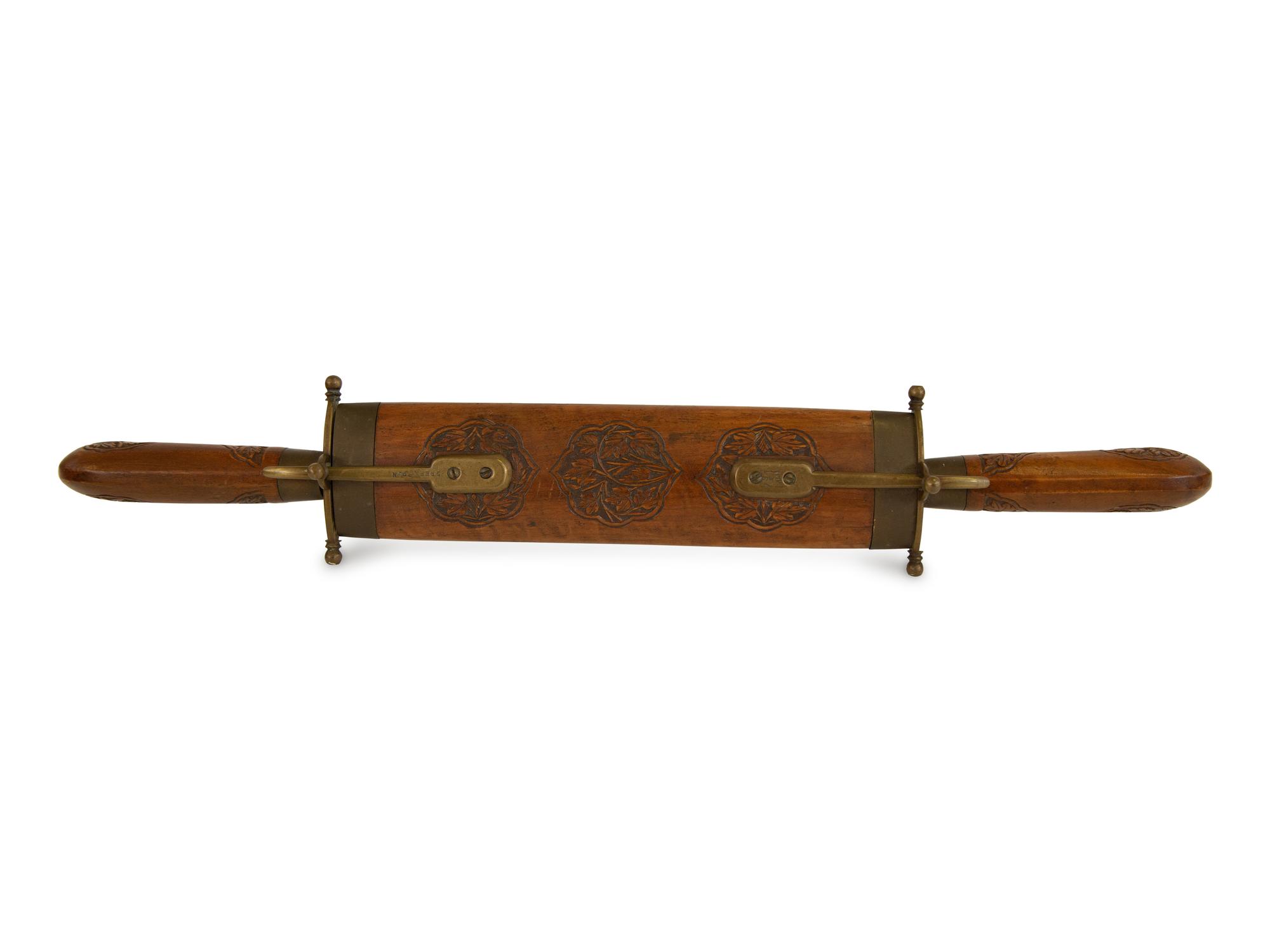 An Indian Carved Hardwood and Brass Dagger and Display Sheath