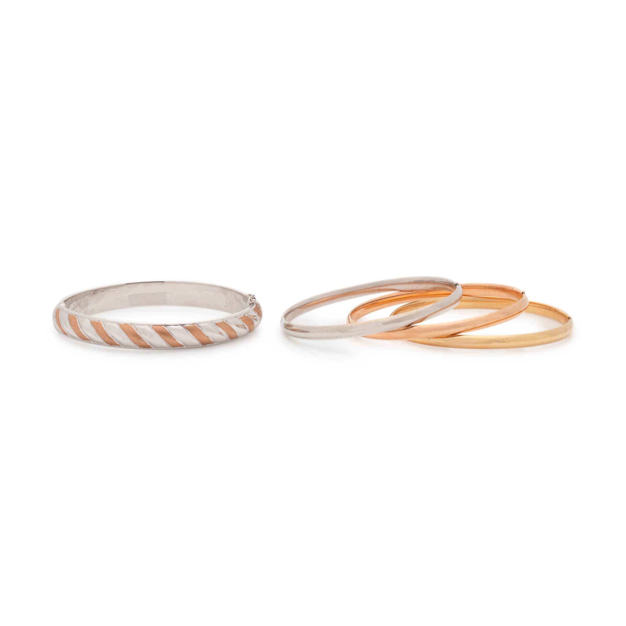 COLLECTION OF GOLD BANGLES