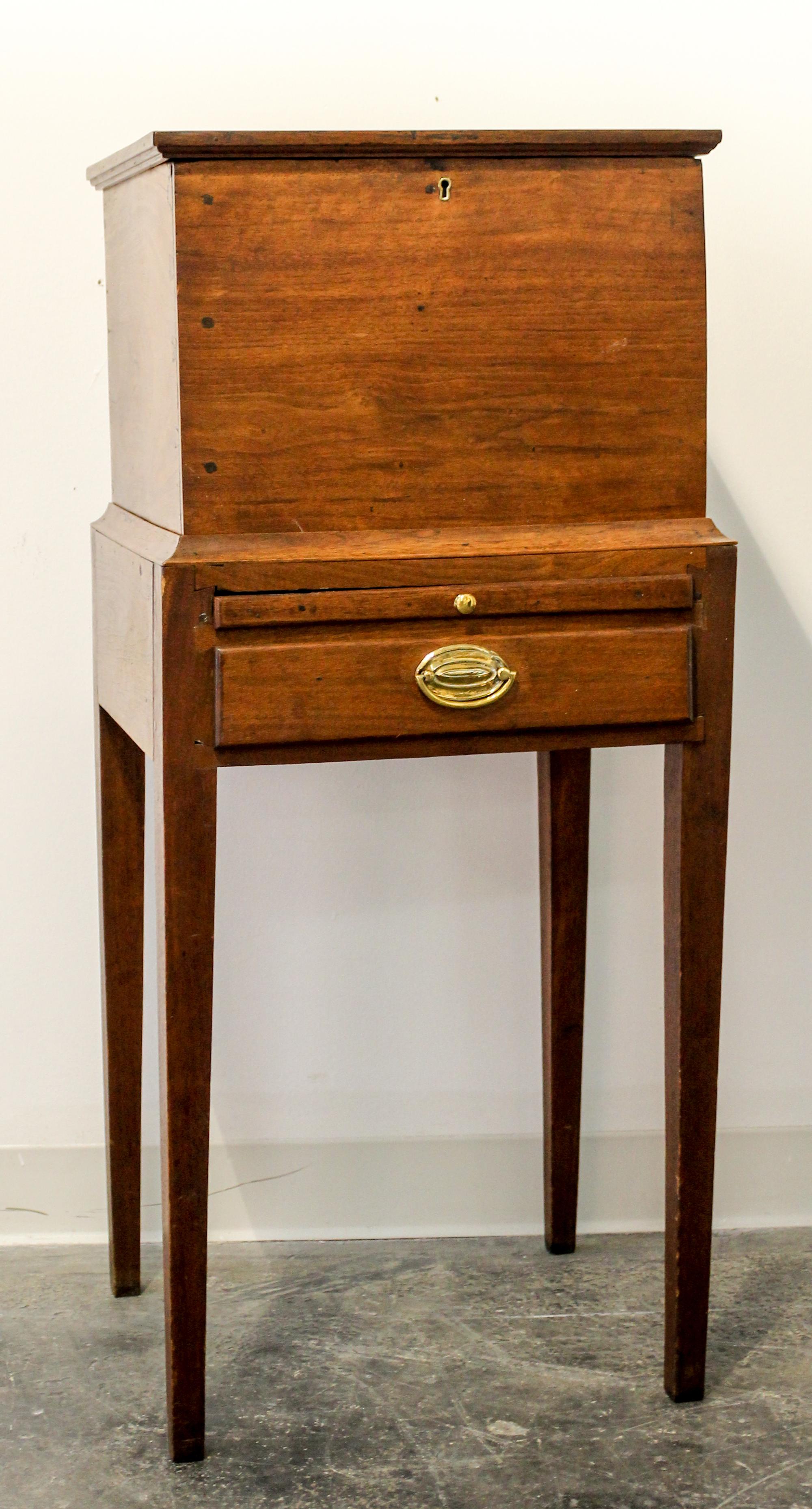 An American Walnut Cellarette Height 41 x width 18 1/4 x depth 15 1/4 inches. — 19TH CENTURY