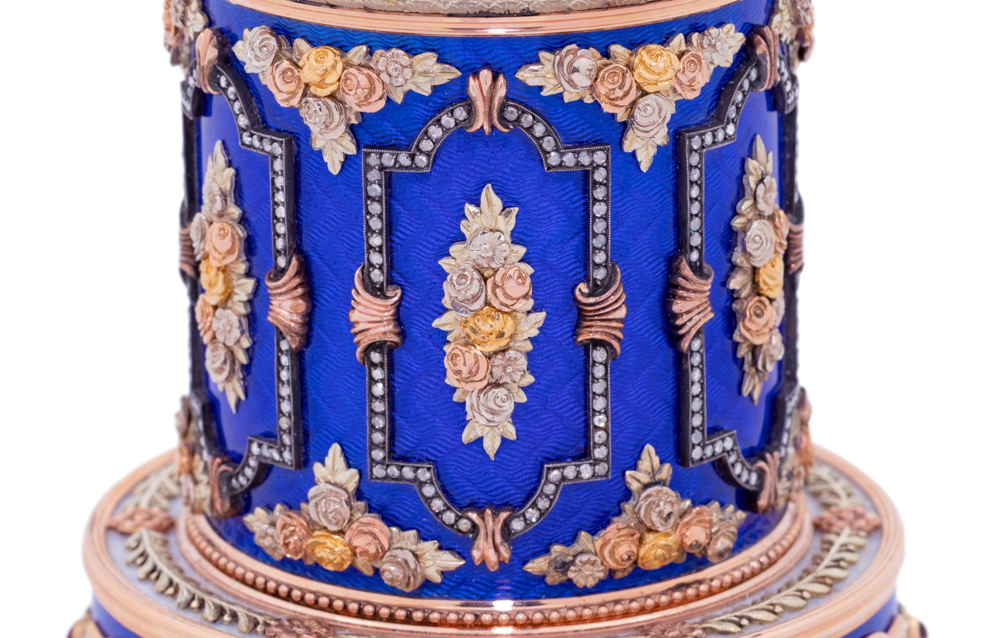 A Gold, Enamel and Diamond Inset Egg-Form Annular Clock