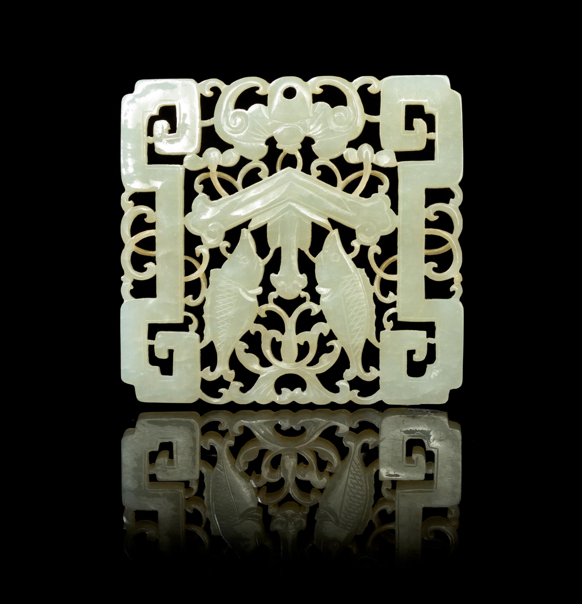 A Pierce Carved Jade Plaque Height 2 7/8 x width 3 inches.