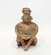 A Nayarit Pre-Columbian Style Pottery Figure Height 10 1/2 inches.