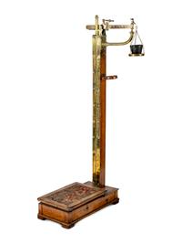 An English Oak and Brass Weighing Scale