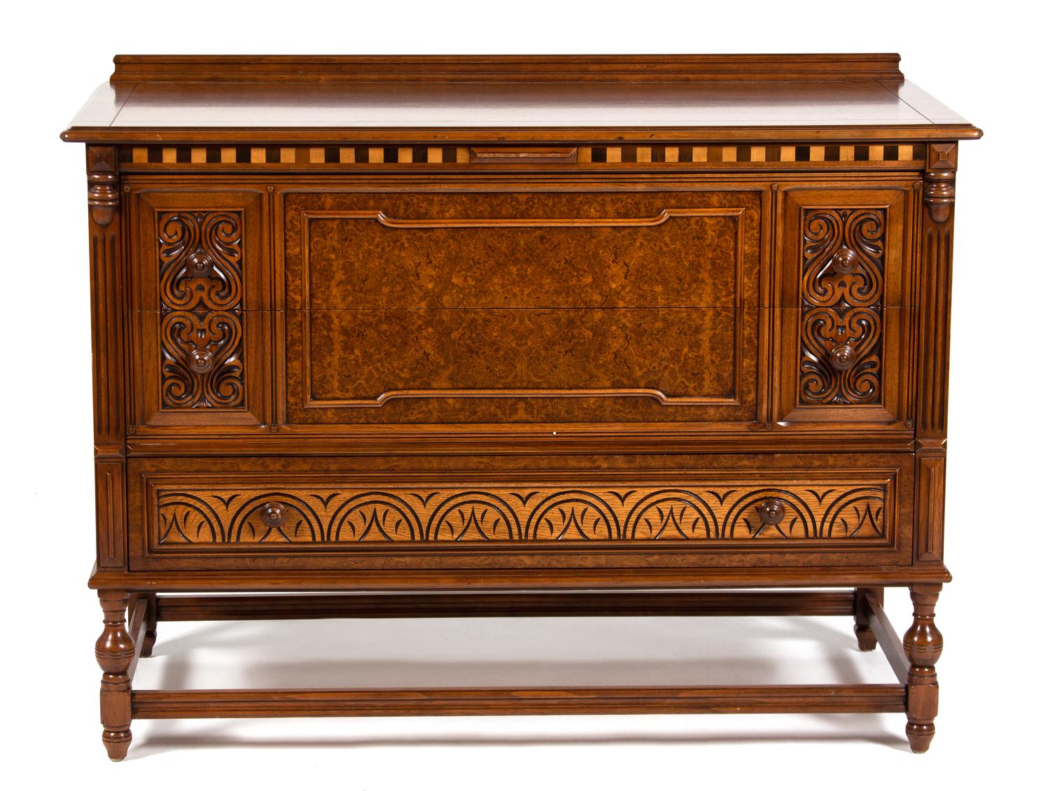 A Jacobean Style Mahogany Dresser Height 37 3/4 x width 50 x depth 22 inches.