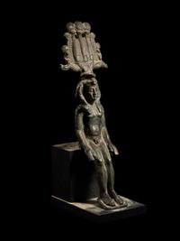 An Egyptian Bronze Seated Harpocrates
