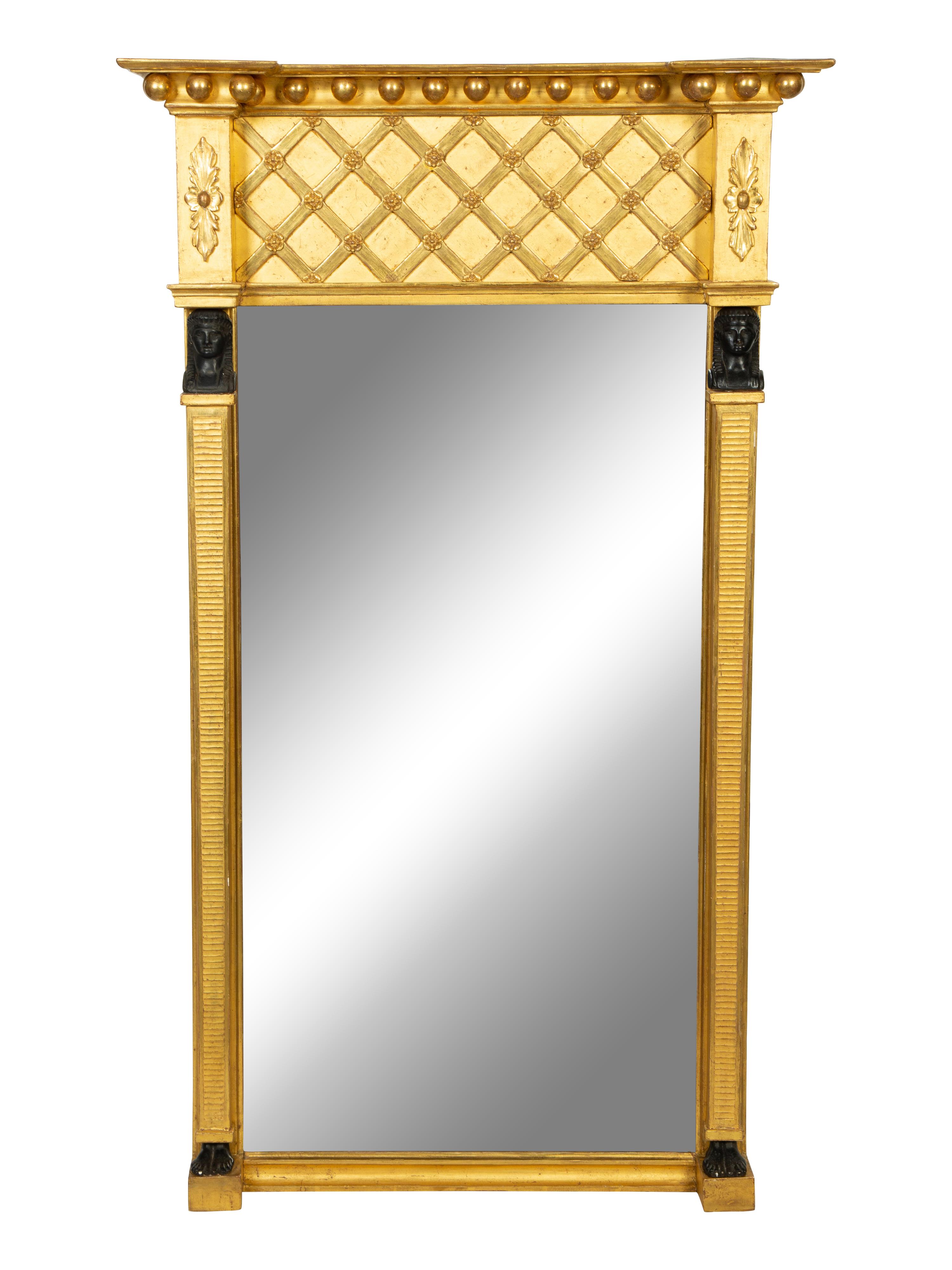 A French Egyptian Revival Giltwood Mirror