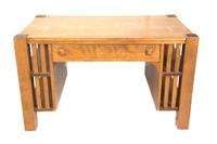 An Arts and Crafts Stickley Style Oak Desk Height 29 x length 48 1/2 x depth 28 1/2 inches. — 20TH CENTURY