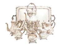 A Peruvian Silver Tea and Coffee Service, Camusso Height of first over handles 18 1/2 inches. — 20TH CENTURY
