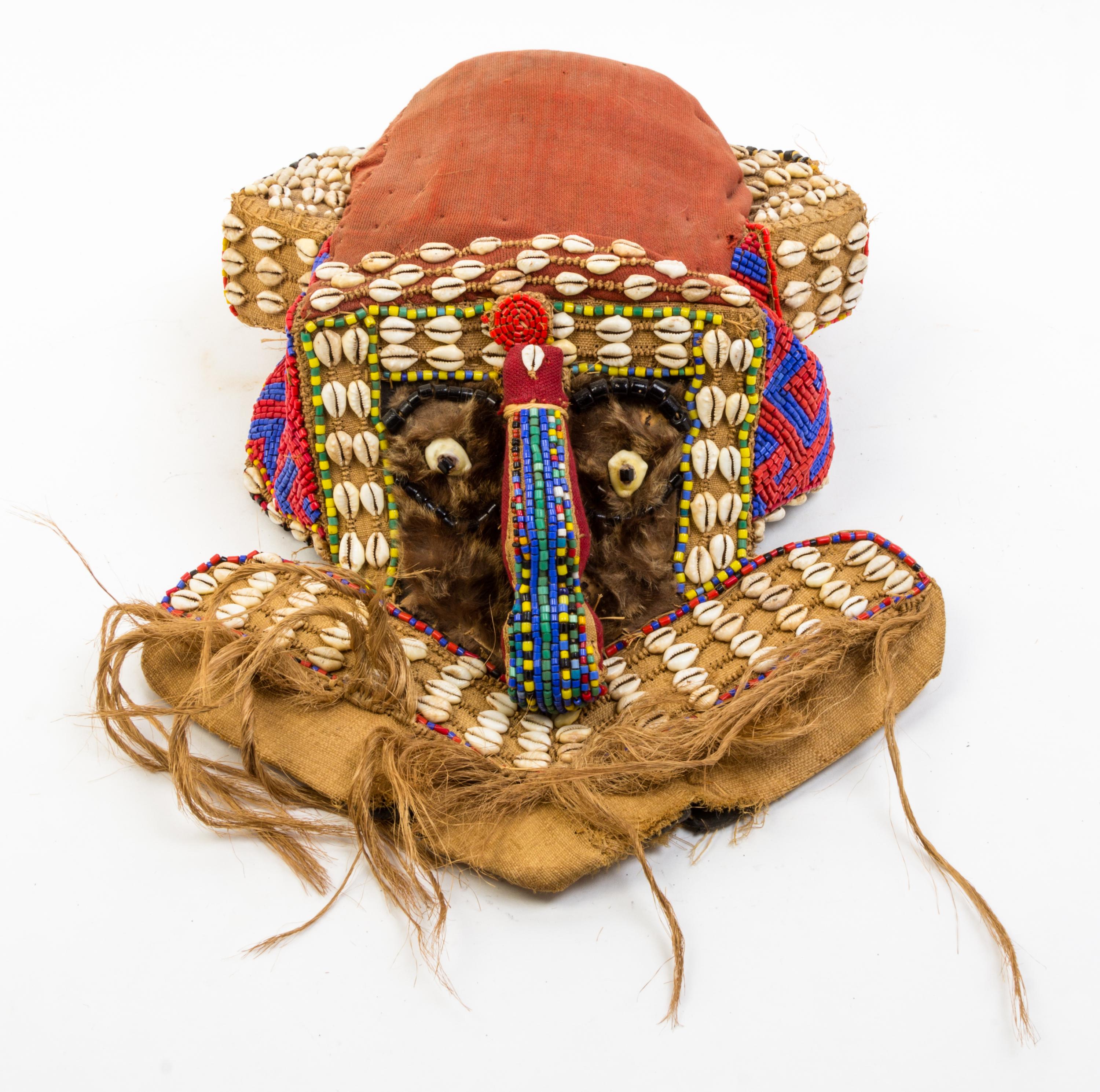 A Kuba Mashamboy Mask Height 12 inches.