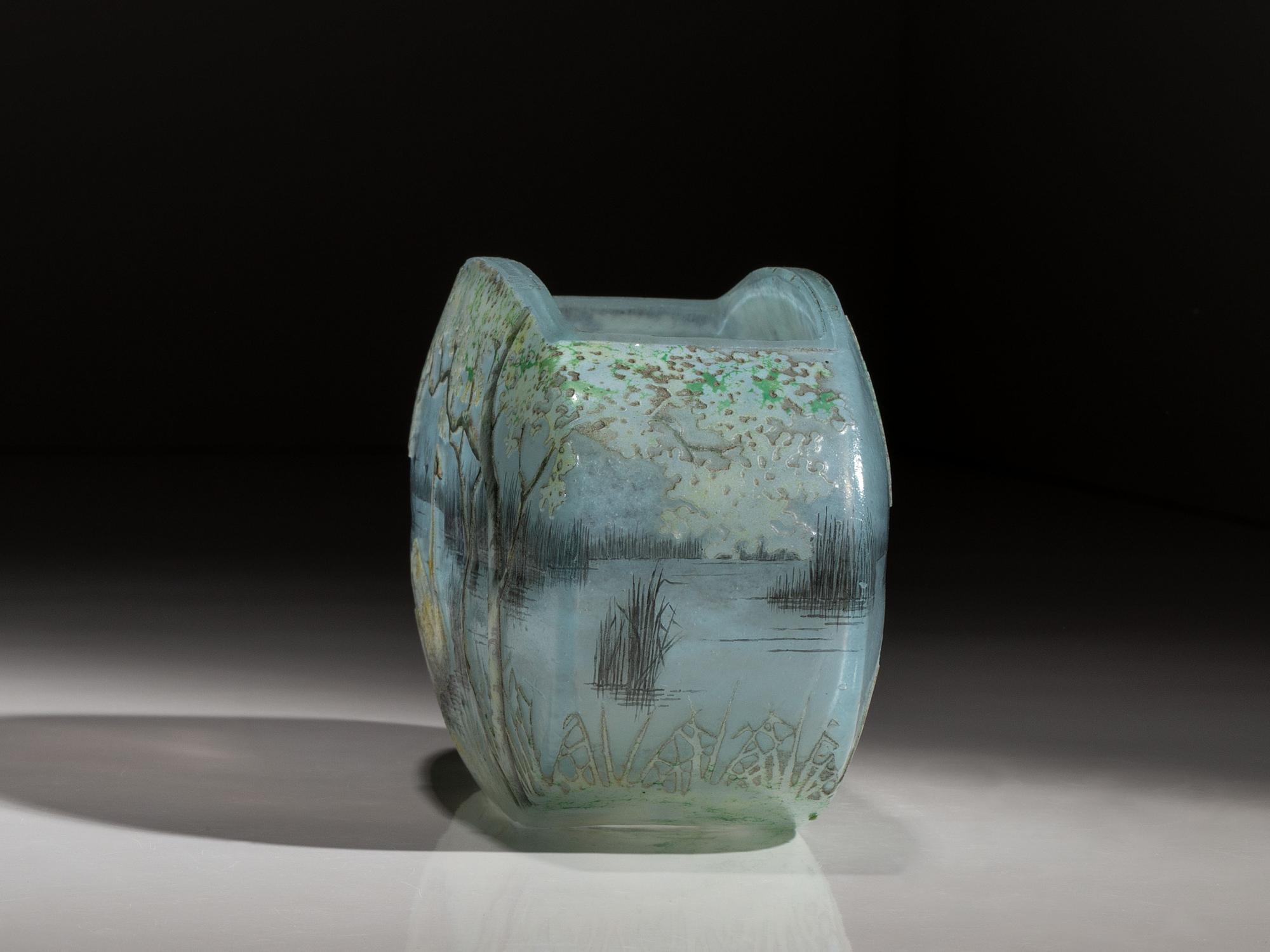 A Daum Enameled Glass Scenic Swan Vase