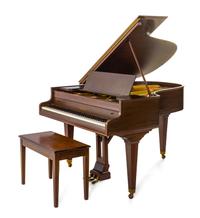 A Chickering & Sons Baby Grand Piano