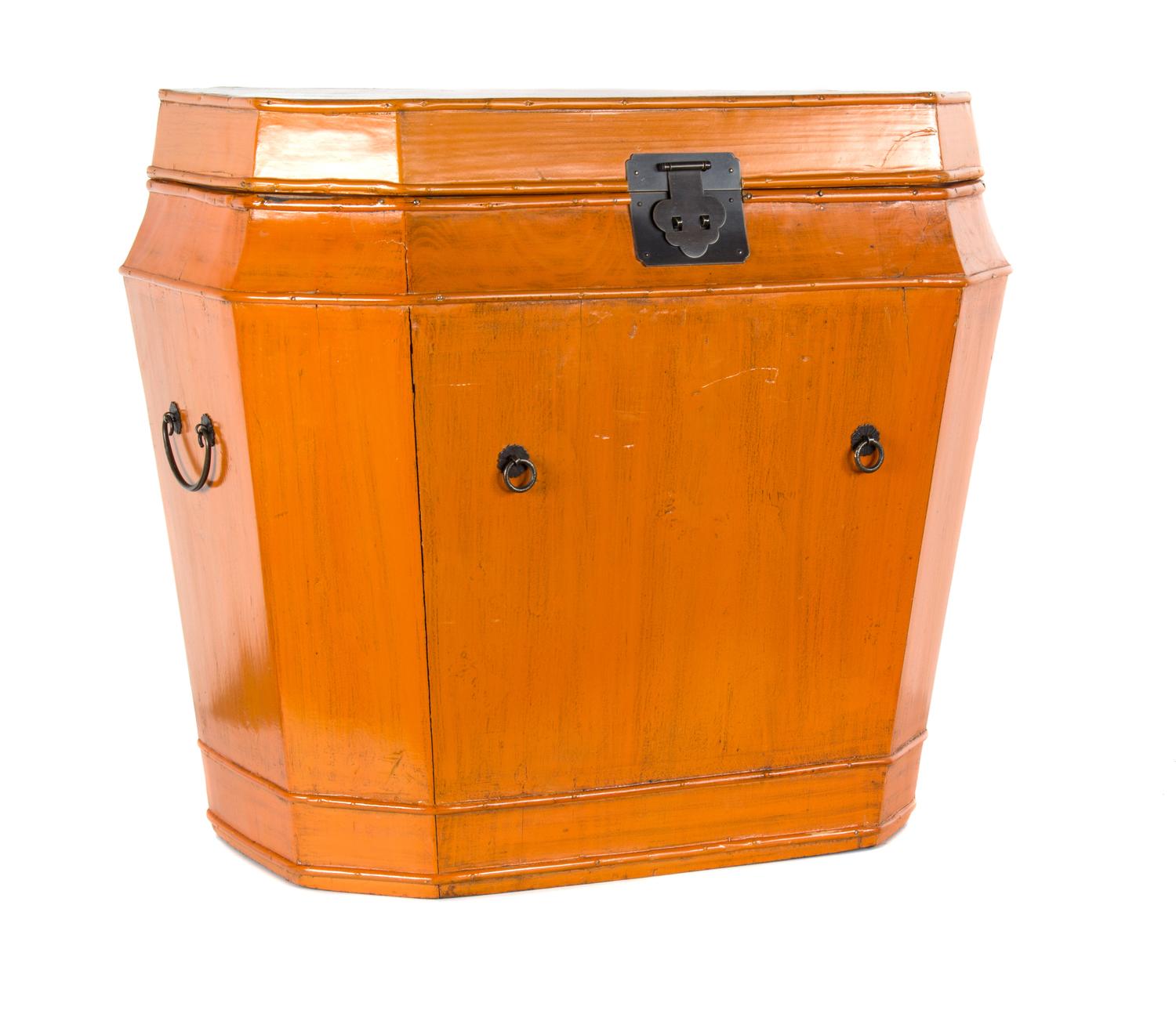 A Large Orange Painted Hinged Top Trunk with Metal Mounts Height 22 3/4 x length 25 1/2 inches.