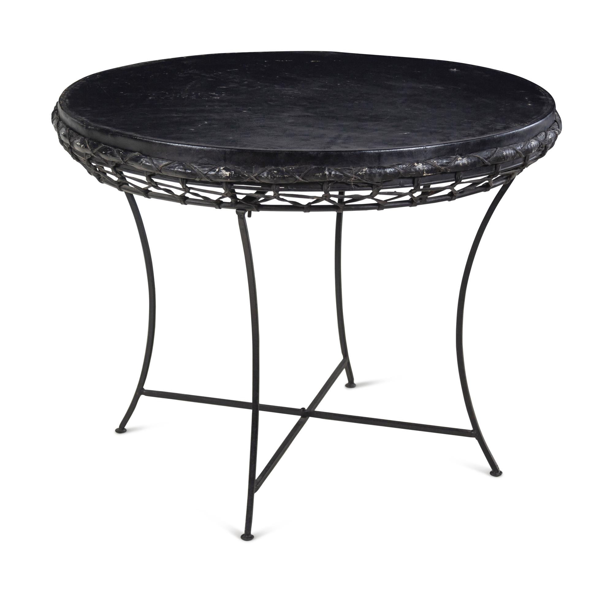 A Rustic Raffia and Hide Side Table with an Iron Base
