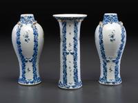 A Chinese Export Parcel Gilt Blue and White Porcelain Garniture