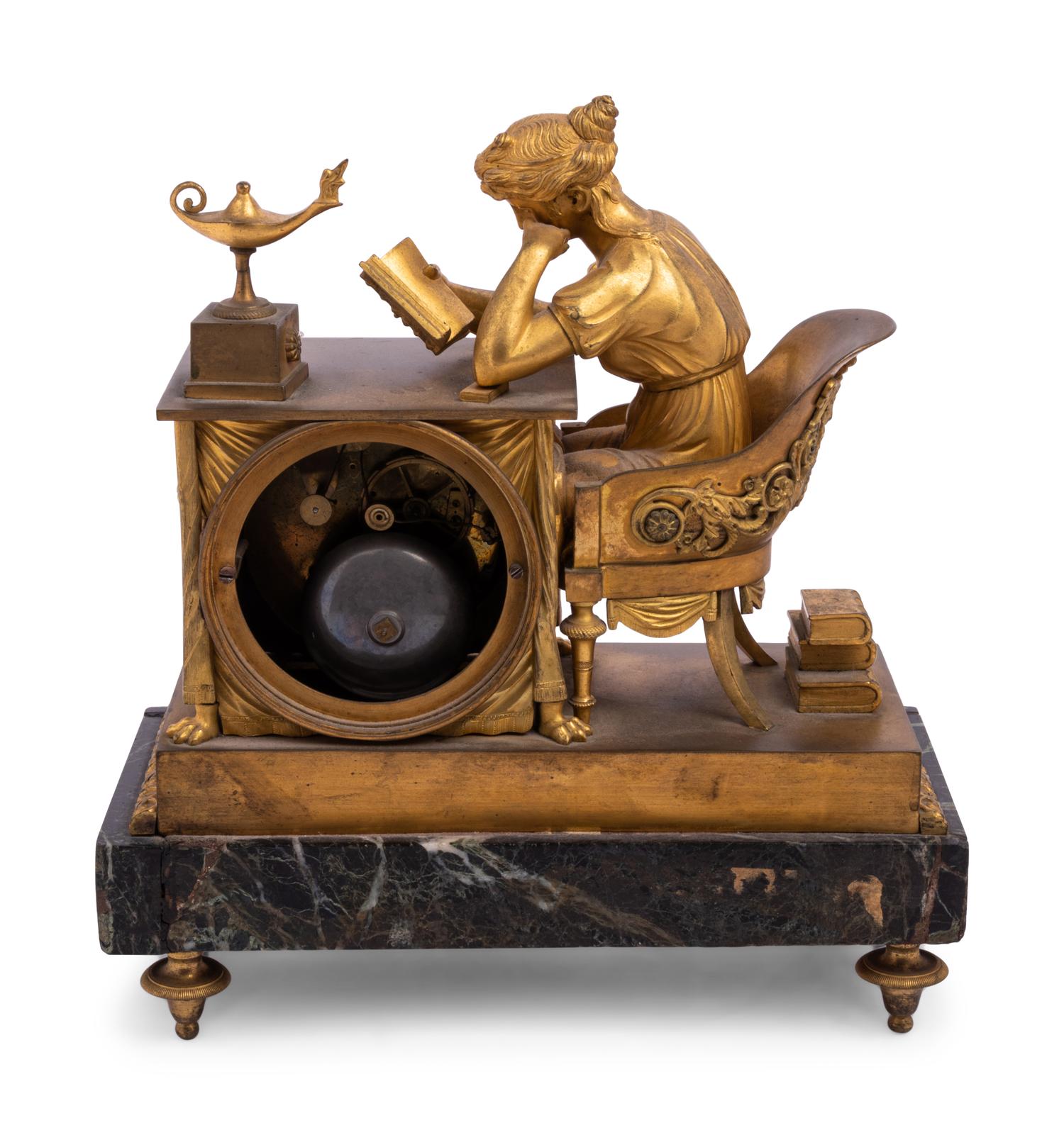 An Empire Gilt Bronze and Marble Figural Mantel Clock