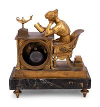 An Empire Gilt Bronze and Marble Figural Mantel Clock