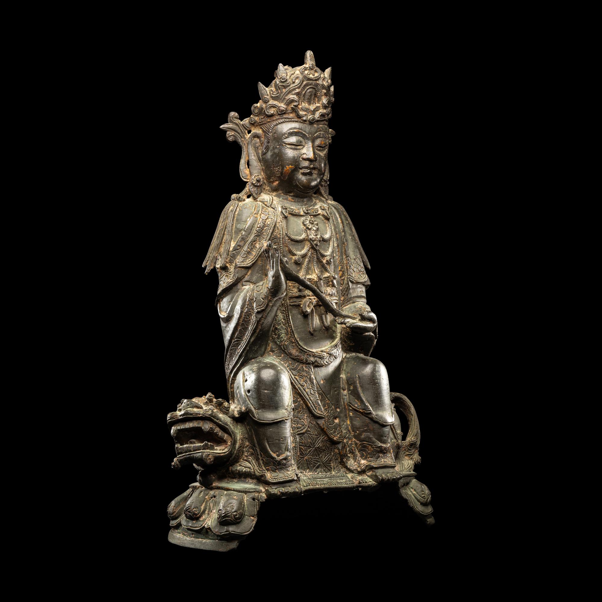 A Chinese Parcel-Gilt Bronze Figure of Guanyin, Ming Dynasty 明 銅局部鎏金觀音坐像