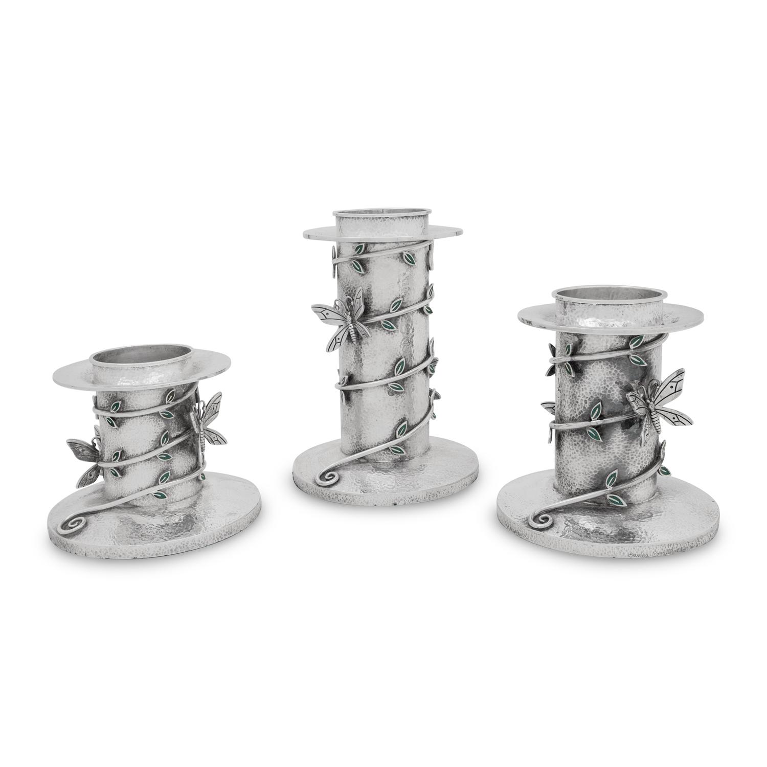 A Set of Three Mexican Silver Graduated Candlesticks