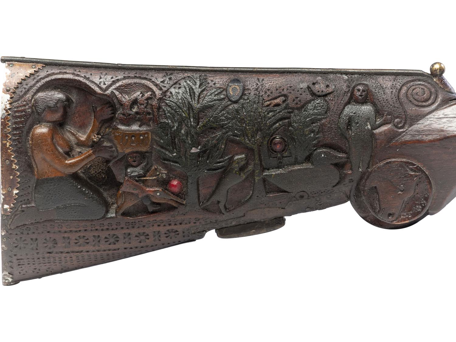 A Folk Art Carved and Punch Decorated Painted Ash Rifle Stock