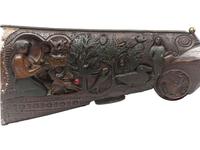 A Folk Art Carved and Punch Decorated Painted Ash Rifle Stock