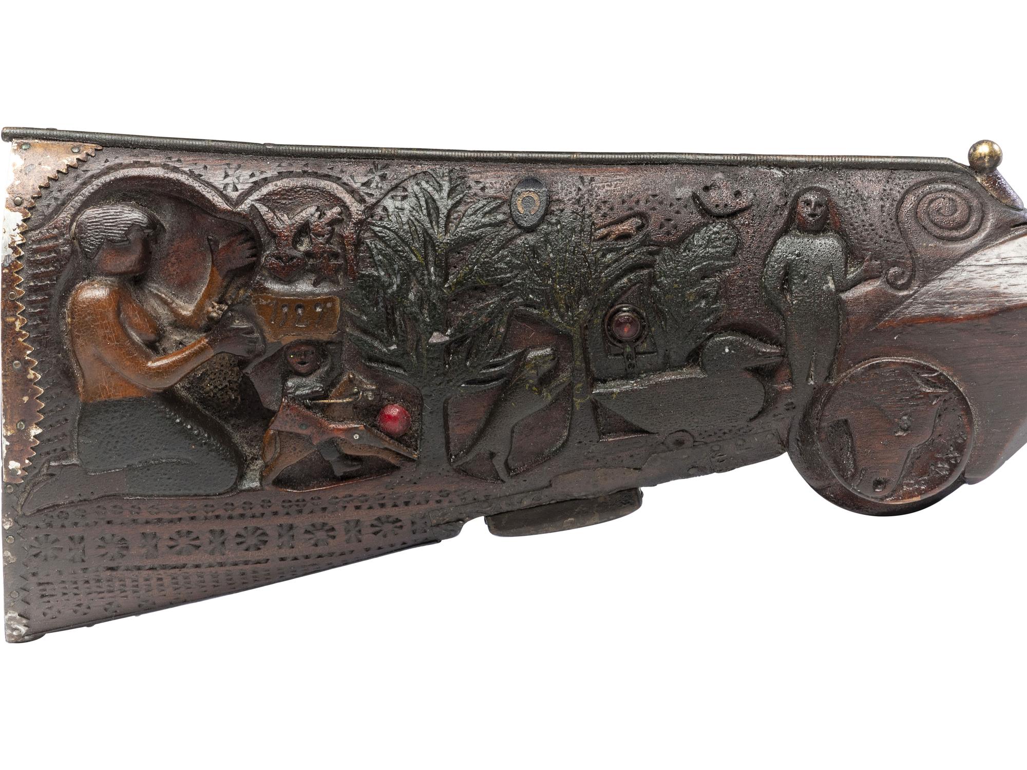 A Folk Art Carved and Punch Decorated Painted Ash Rifle Stock