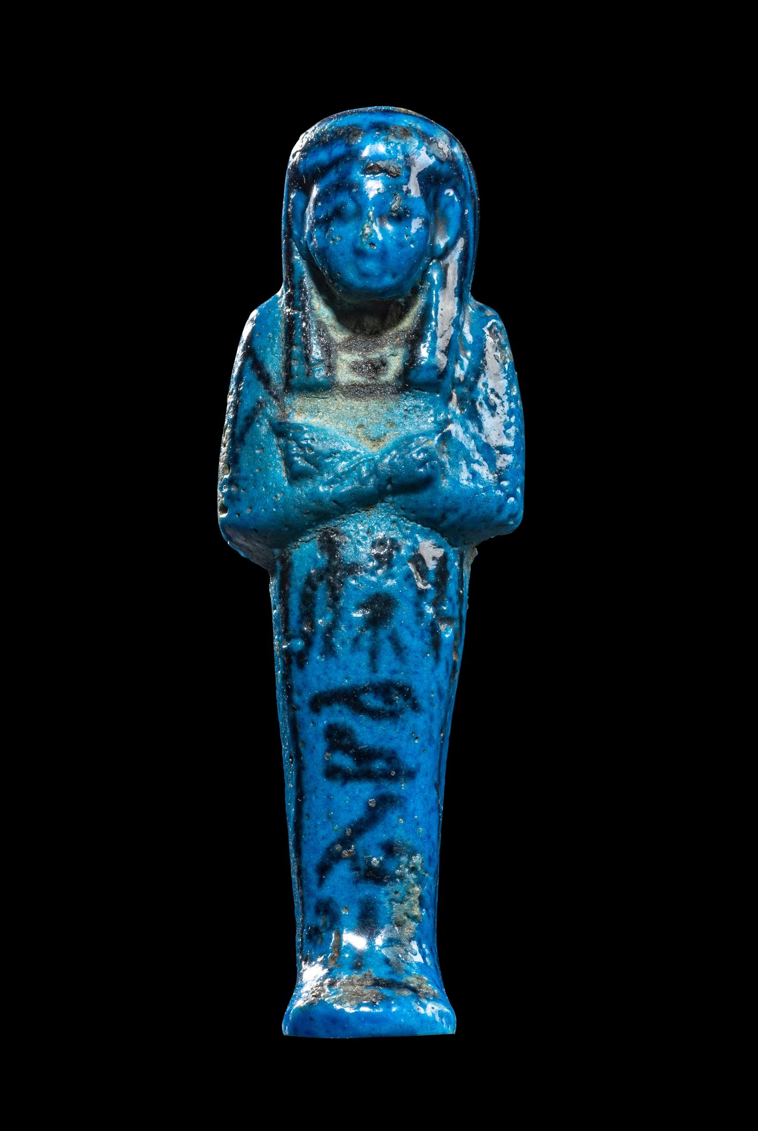 An Egyptian Blue Faience Ushabti for Tayuheret