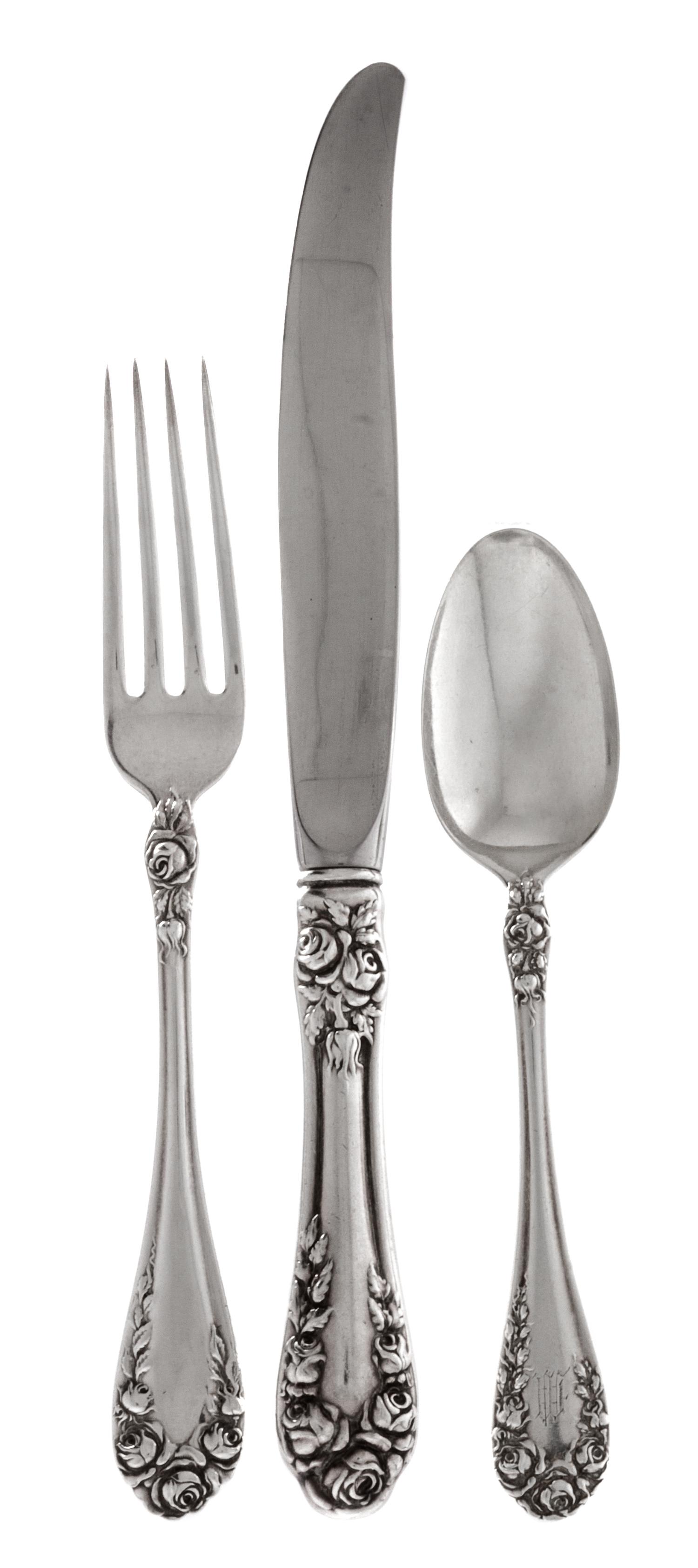 An American Silver Flatware Service, R. Wallace & Sons, Wallingford, CT, Rose pattern, comprising: 8 dinner knives 6 butter spreaders (