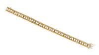An 18 Karat Yellow Gold and Diamond Line Bracelet, 17.80 dwts.