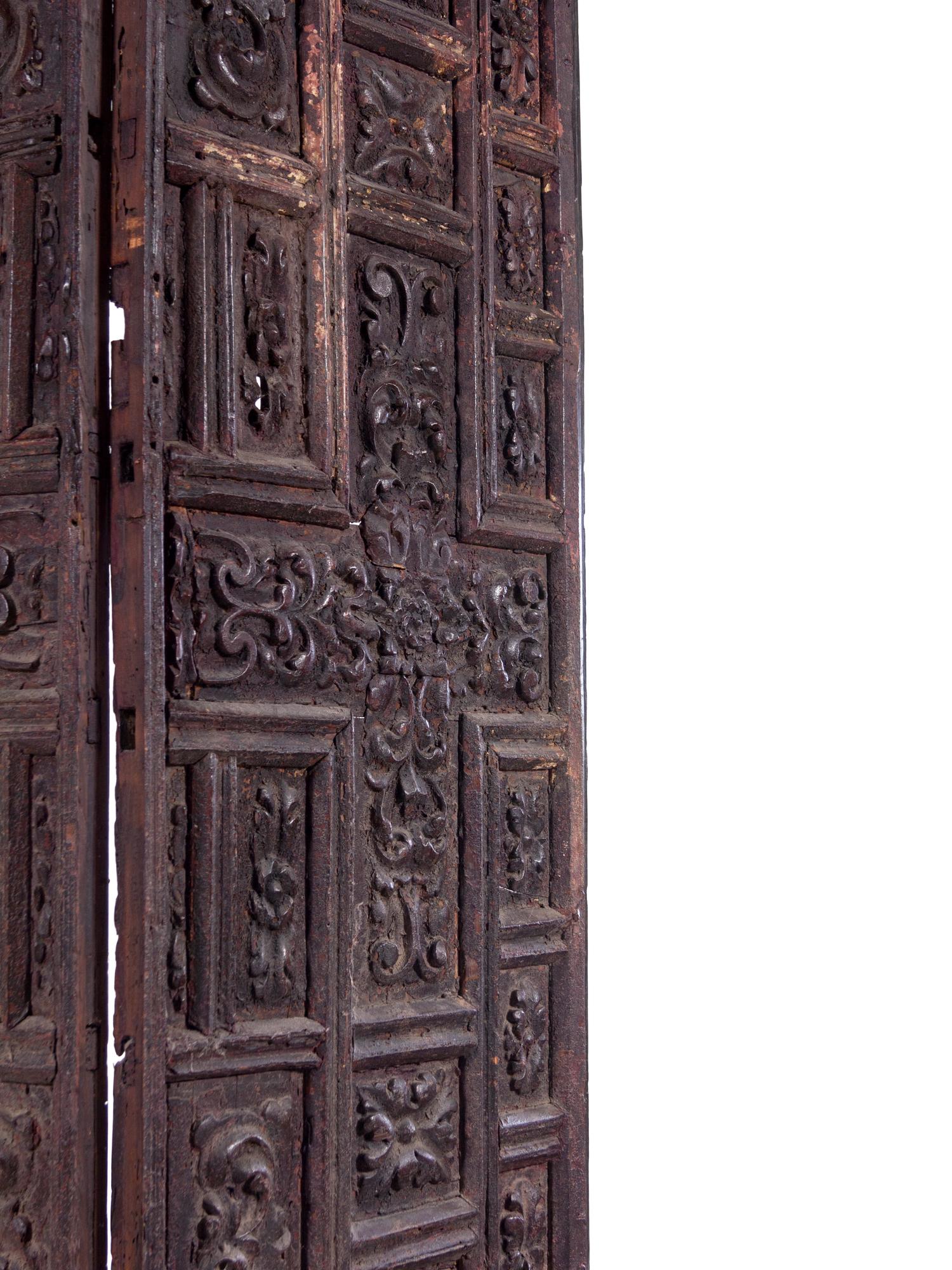 A Pair of Continental Carved Panels or Doors
