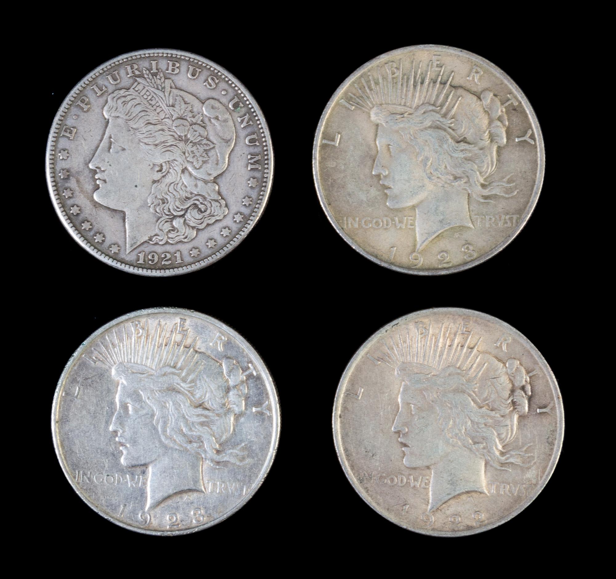 Four U.S. Silver Dollar Coins
