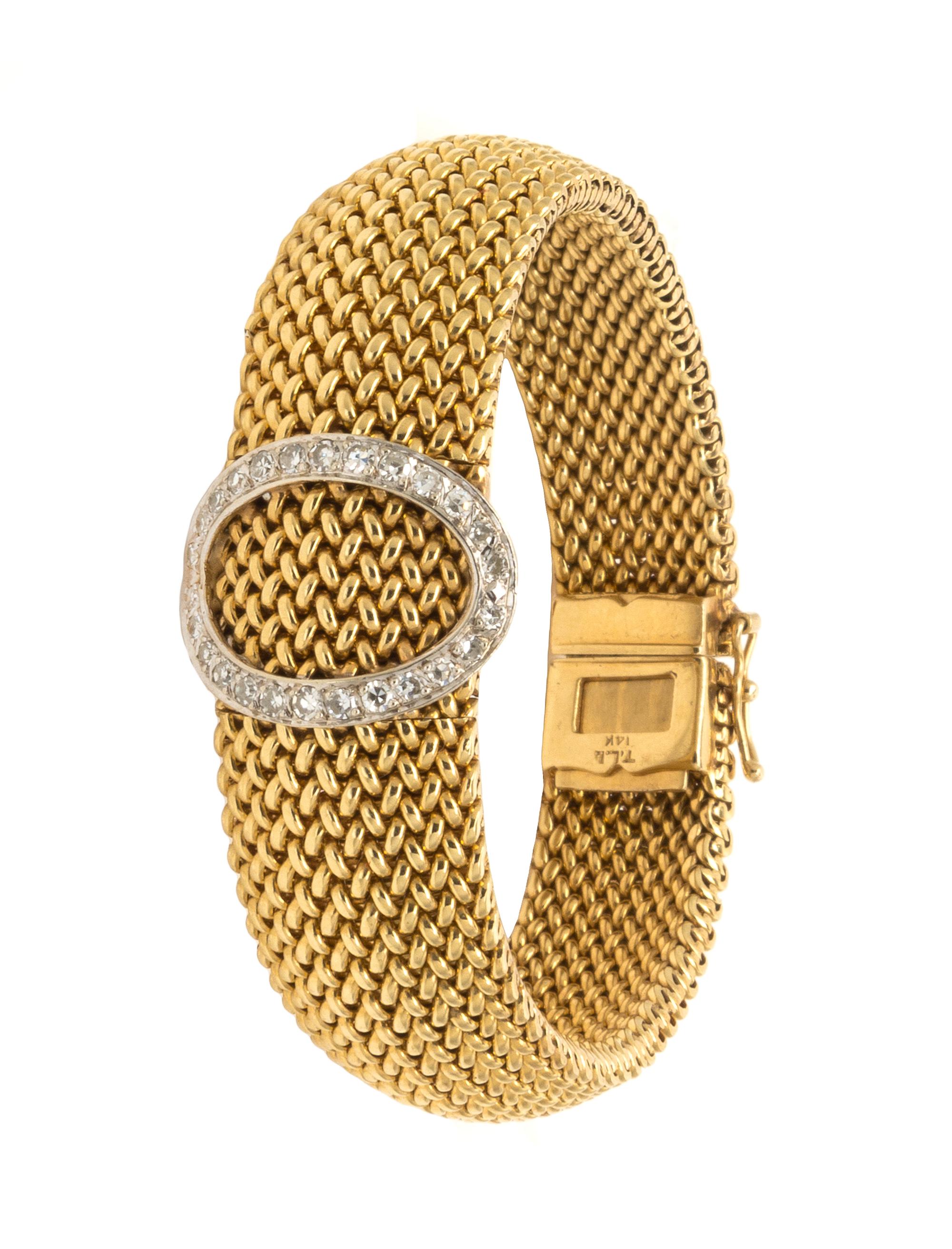A 14 Karat Yellow Gold and Diamond Surprise Wristwatch, Ebel, 35.00 dwts.