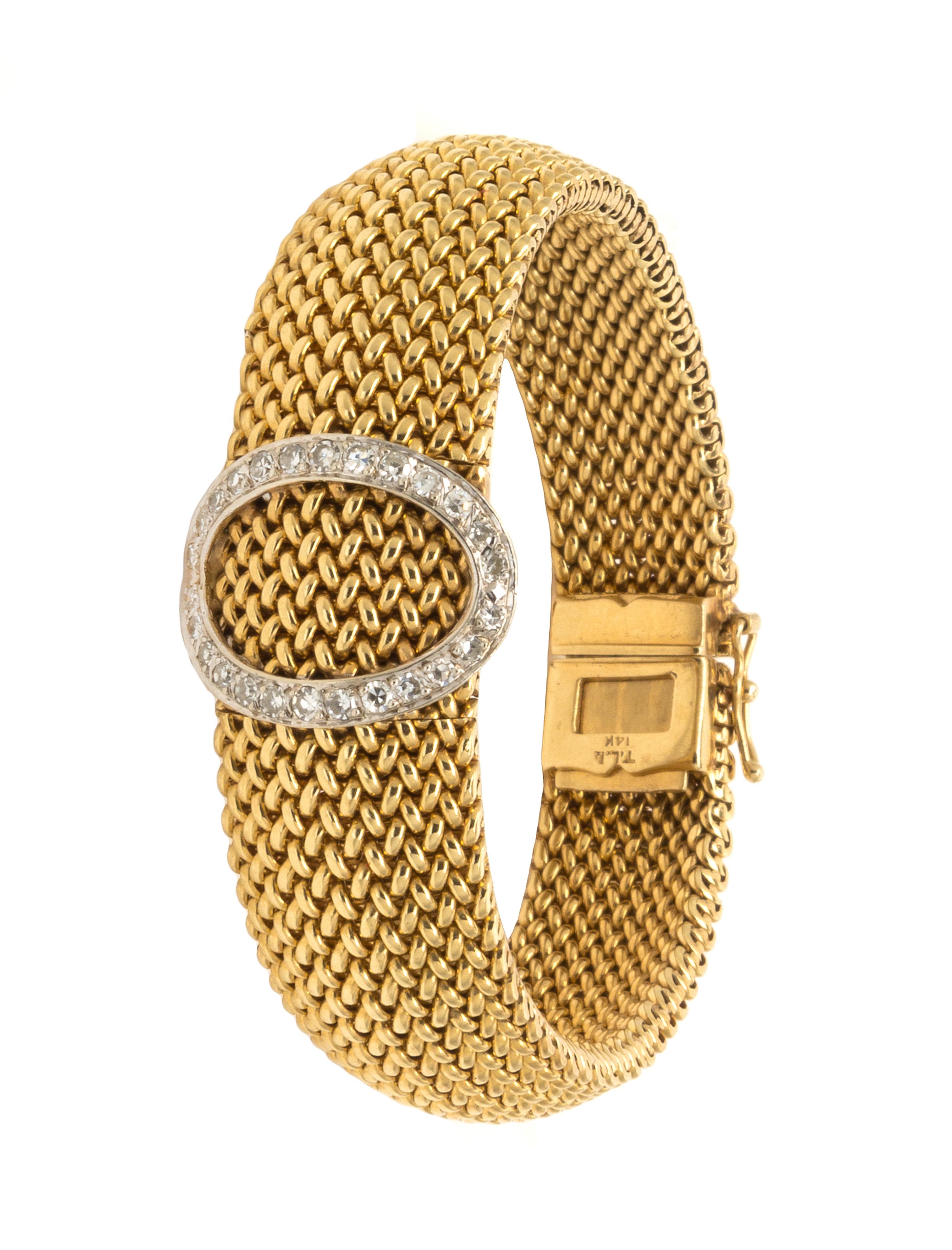 A 14 Karat Yellow Gold and Diamond Surprise Wristwatch, Ebel, 35.00 dwts.