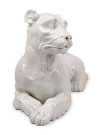 An Italian Painted Terra Cotta Figure of a Recumbent Dog