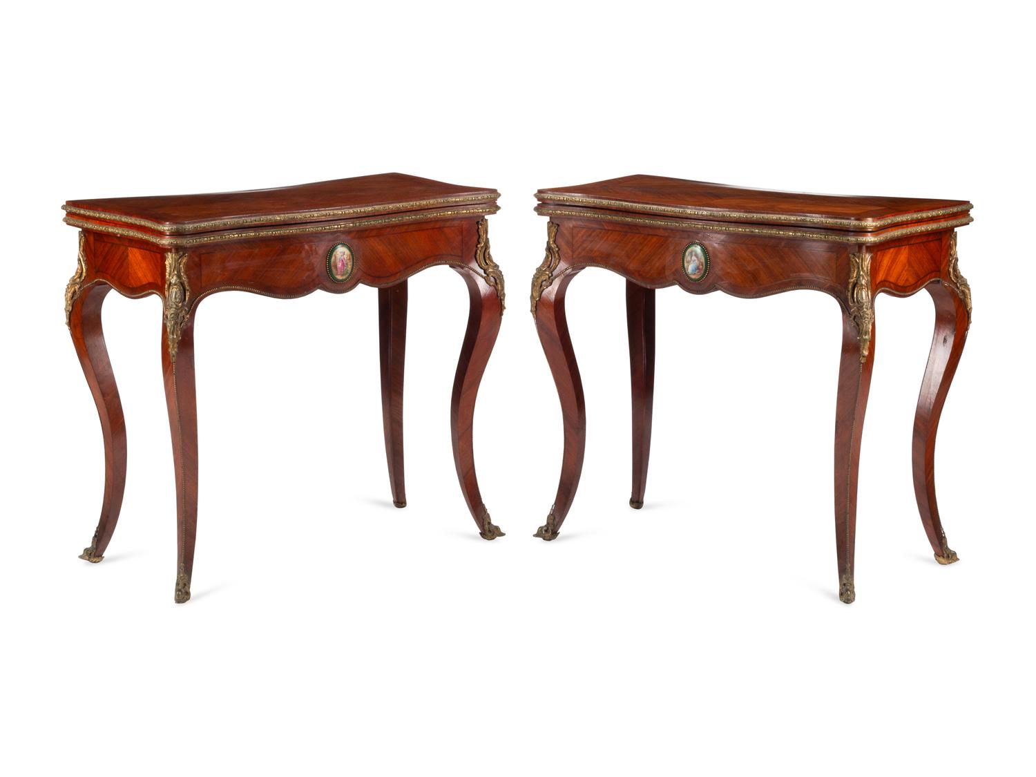 A Pair of Louis XV Style Gilt Bronze and Porcelain Mounted Flip-Top Tables