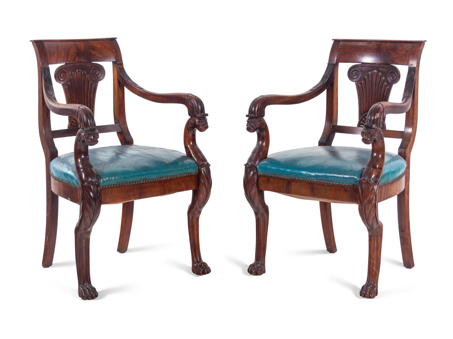 A Pair of Baltic Neoclassical Carved Mahogany Armchairs