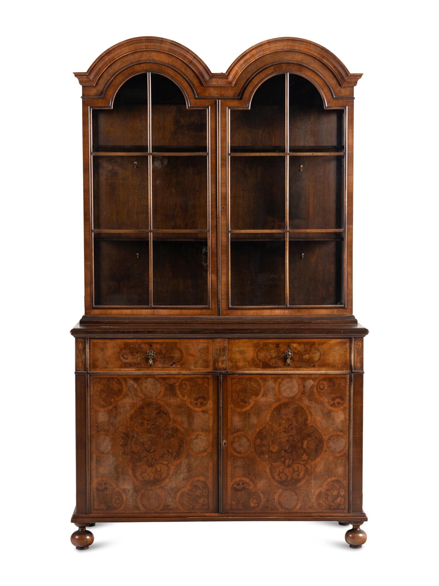 A William and Mary Style Walnut and Marquetry Bookcase