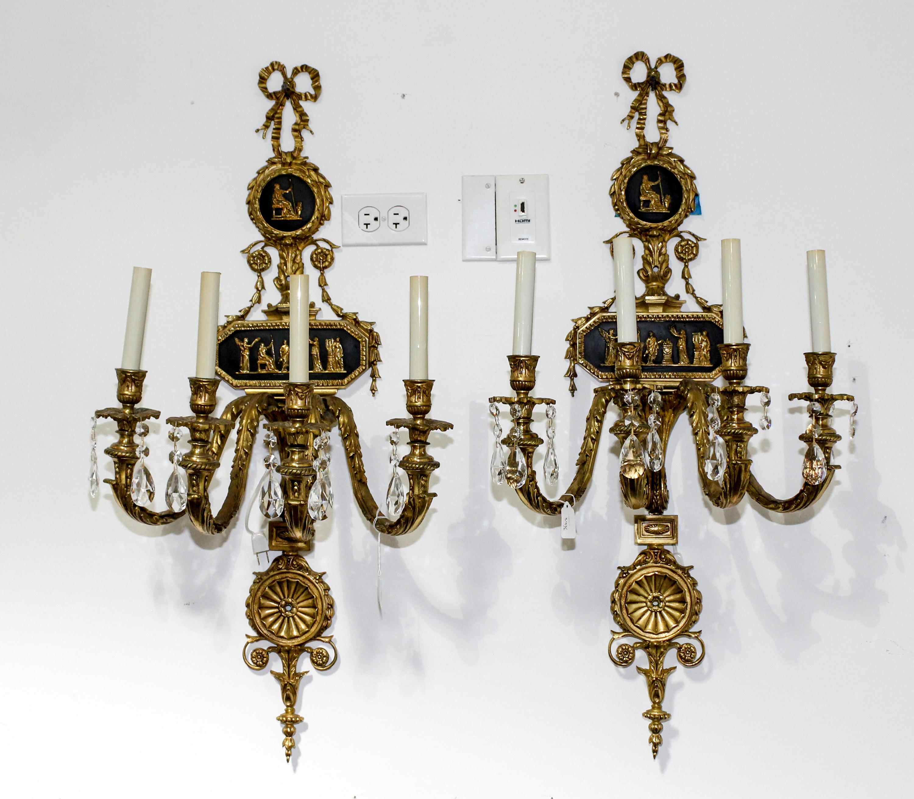 A Pair of Neoclassical Gilt Bronze Four Light Sconces Height 36 1/2 inches. — 20TH CENTURY