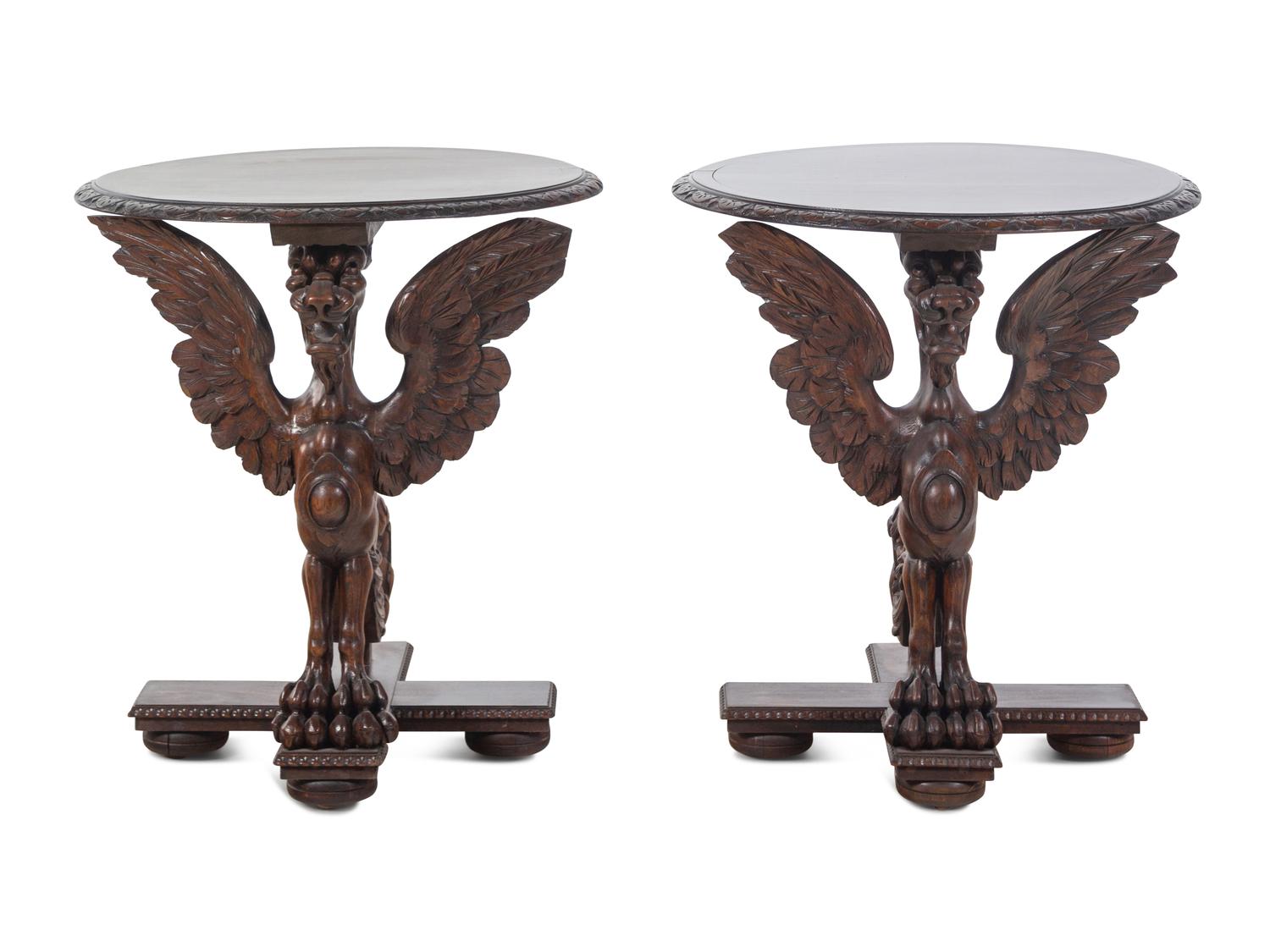 A Pair of Continental Baroque Style Carved Walnut Griffin Tables